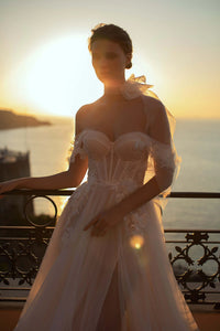 Embrace the daring spirit and make a statement in the Robe Natalia for your special day. This wedding dress exudes confidence and elegance with its stunning design. Be bold and captivate the crowd in this unforgettable bridal gown.