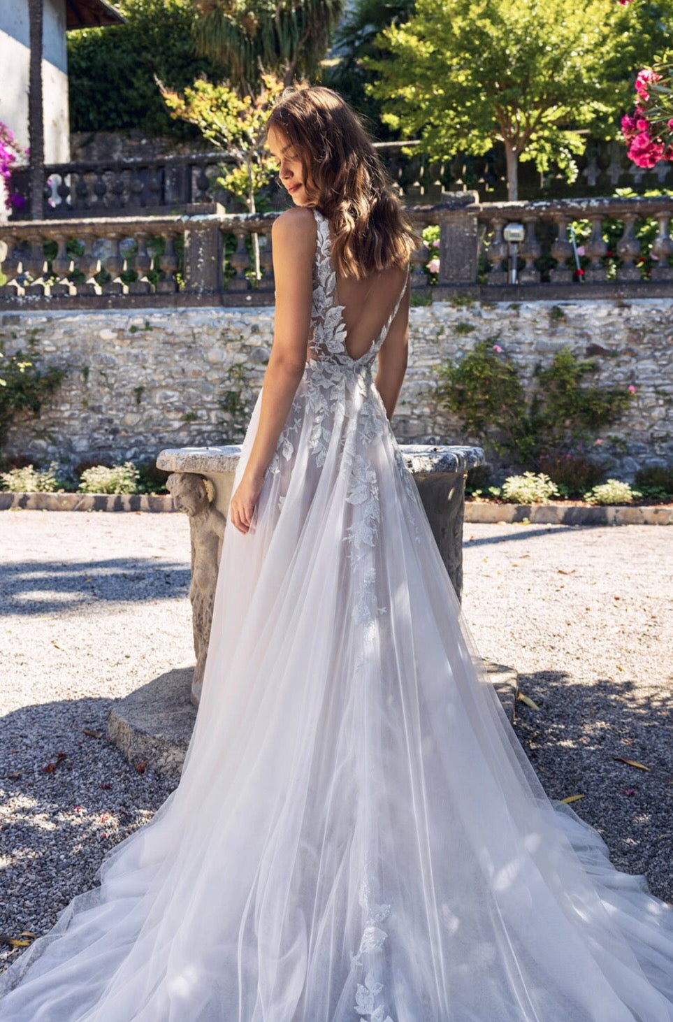 Indulge in the exquisite elegance of the Robe Caroline. This bridal wedding gown features delicate lace details, creating a truly stunning look for any bride. With its timeless design and intricate craftsmanship, this gown is the perfect choice for making everlasting memories on your special day.