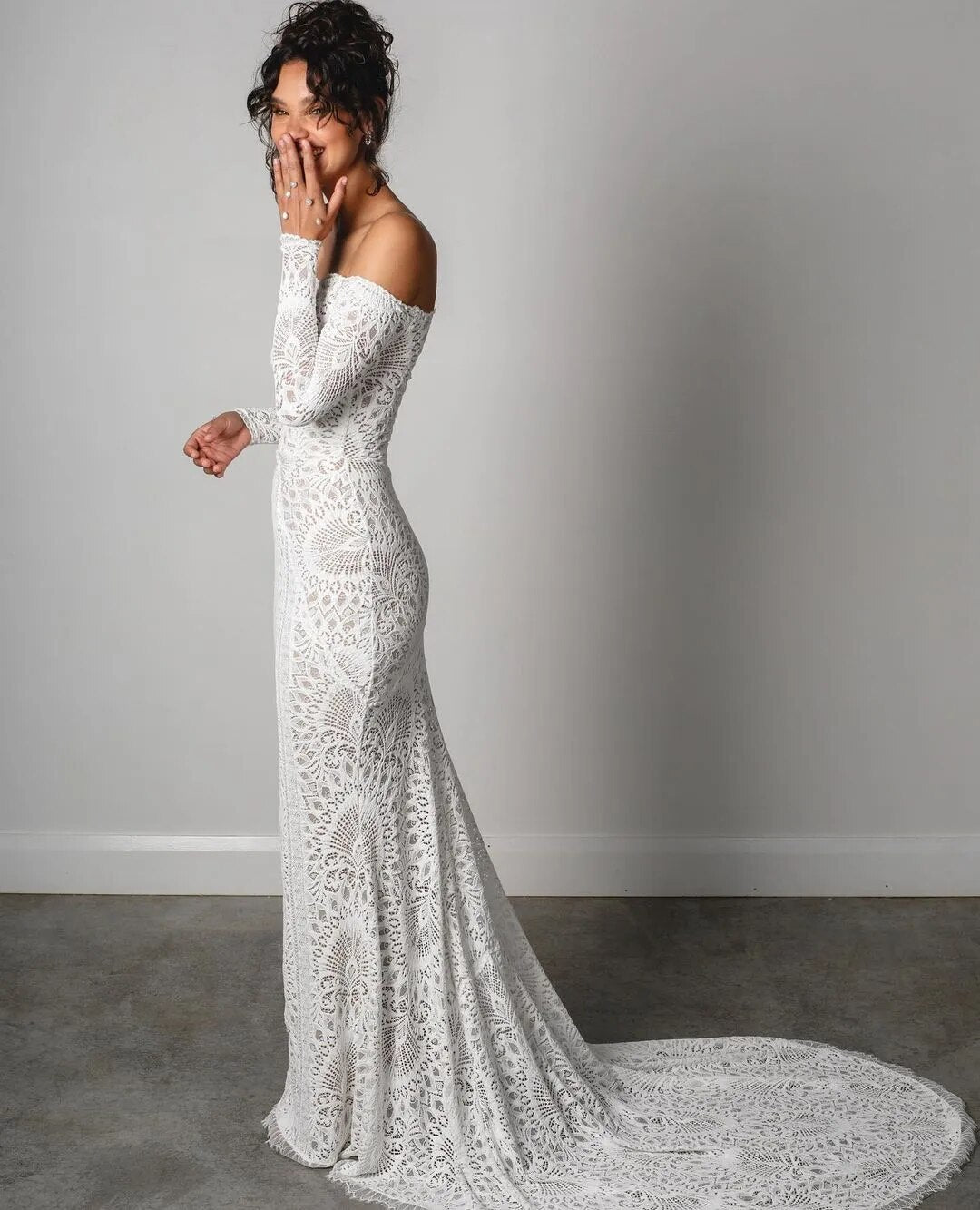 The Nathalia Gown exudes European charm with delicate textures and refined elegance. Its intricate trims and panelling evoke a romantic garden ambience, perfect for any special occasion. Embrace its timeless beauty and feel like a true fashion icon.