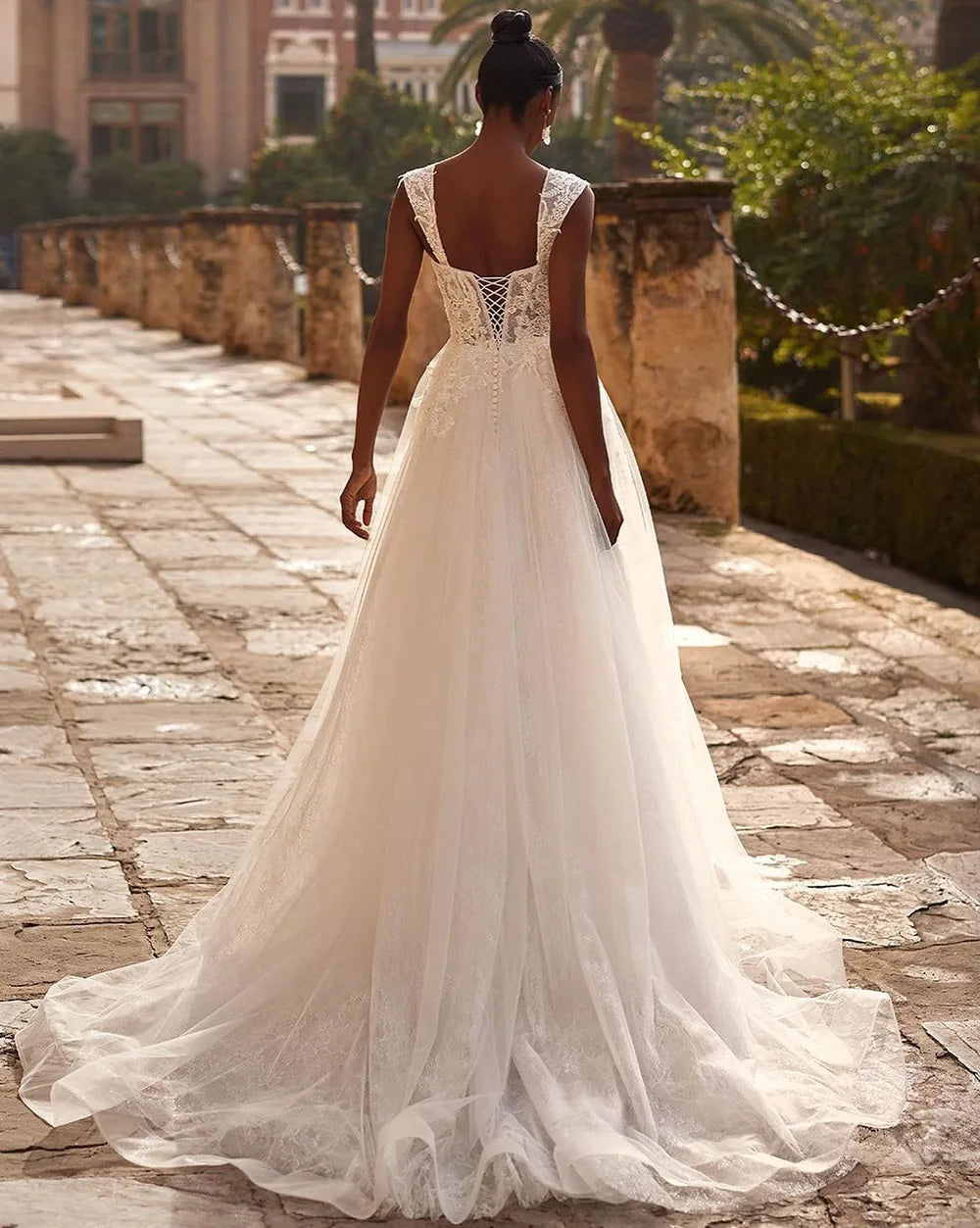 Indulge in the opulent elegance of our Robe Martine. With exquisite appliques and a figure-flattering A Line silhouette, this bridal gown exudes sophistication. The corset backless design adds a touch of sensuality, making it the perfect choice for the boho bride. Embrace luxury and stand out on your special day.
