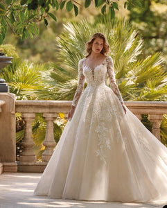 Elevate your bridal look with our Robe Adeline! This elegant lace gown features chic mid sleeves and a flattering A-line silhouette. The classic white color adds a touch of sophistication to your wedding ensemble. Make a statement on your special day with this must-have piece!