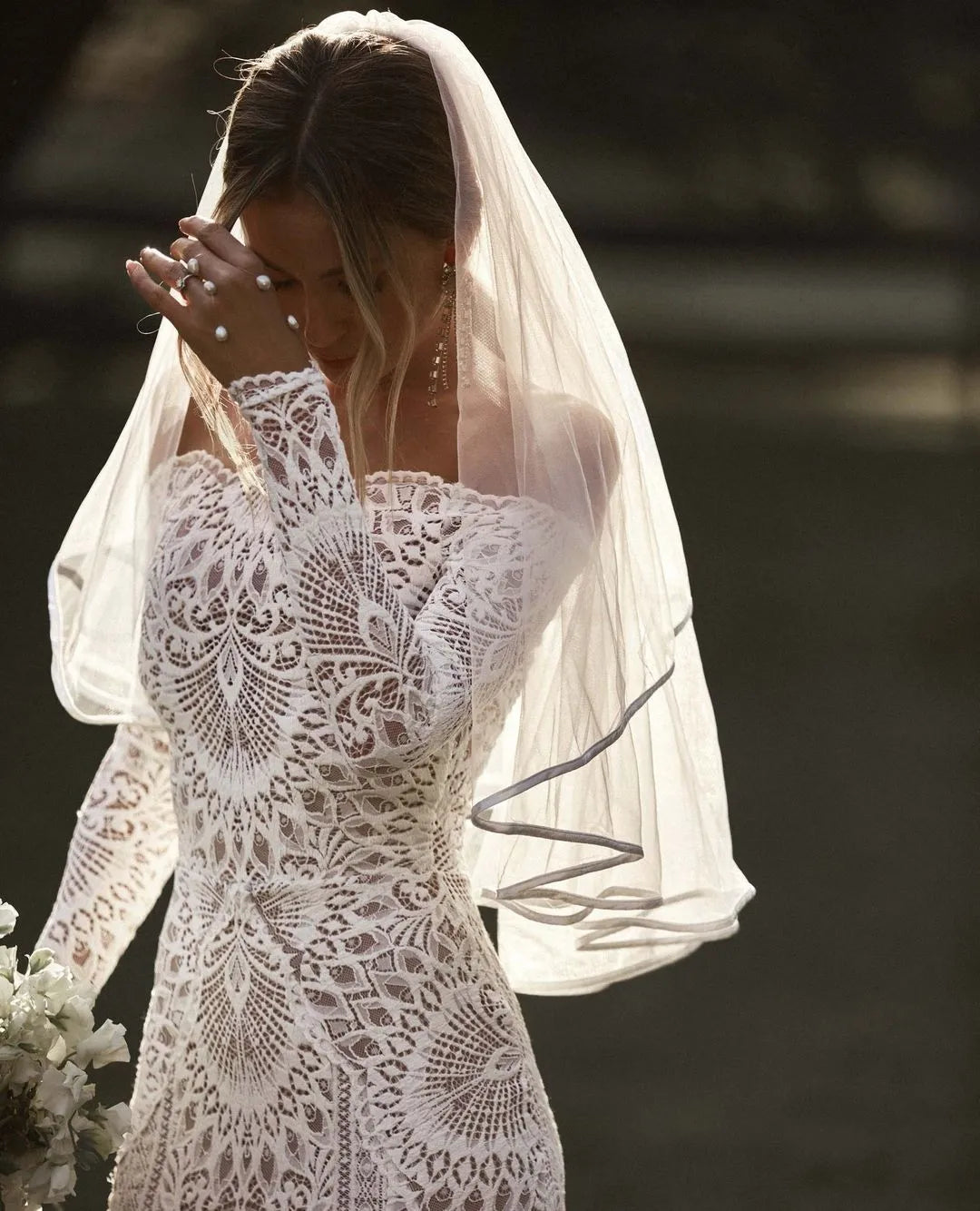 The Nathalia Gown exudes European charm with delicate textures and refined elegance. Its intricate trims and panelling evoke a romantic garden ambience, perfect for any special occasion. Embrace its timeless beauty and feel like a true fashion icon.