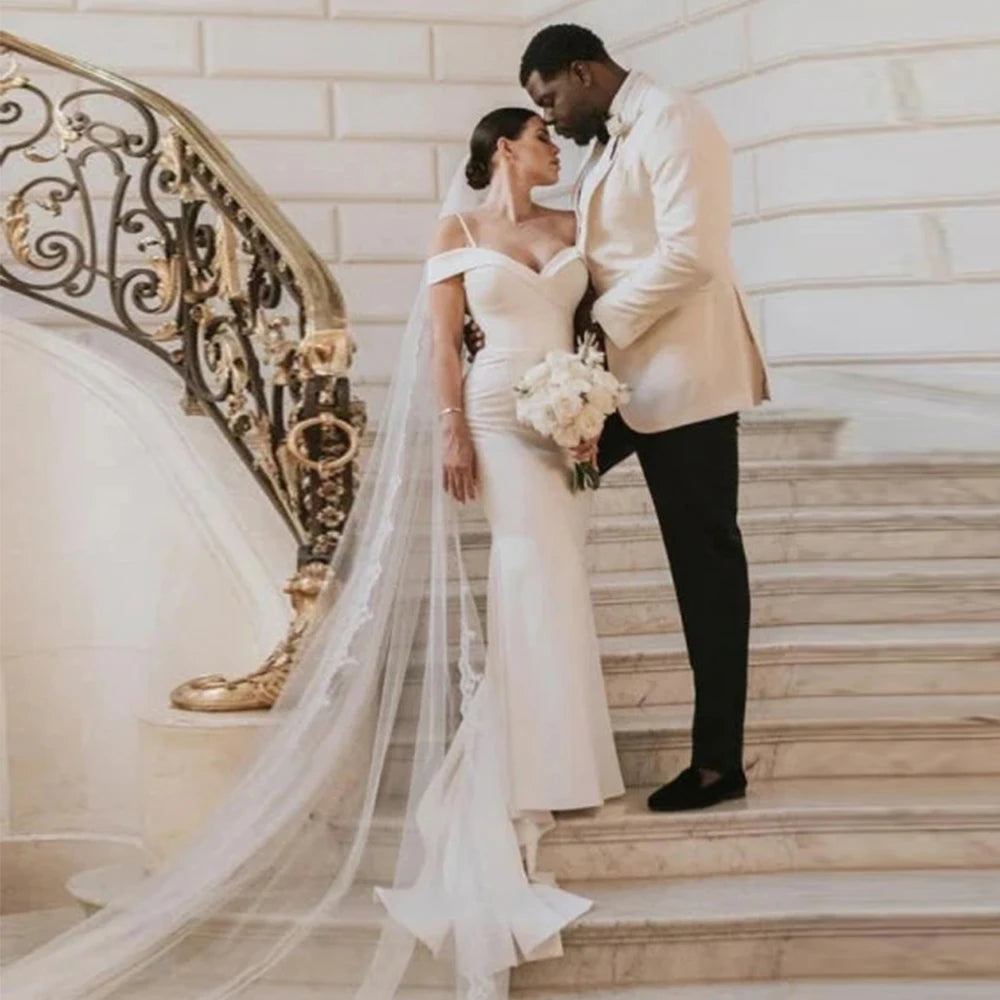 Capture hearts in the beautiful Satin Dress Emma. Custom made with exquisite details, this classic outdoor wedding dress is perfect for a stunning and elegant look on your special day. Enjoy the open design as you confidently walk down the aisle. Make a statement that will be remembered forever.