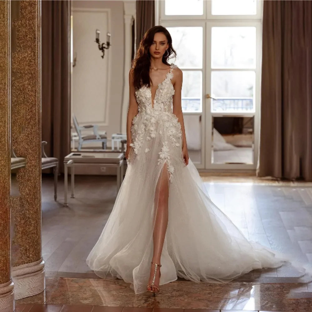 Discover elegance and allure with the Robe Saira. The classic lace appliques add a touch of romance, while the A-Line silhouette accentuates your curves. The daring side high slit adds a sexy and modern twist. Walk down the aisle with confidence and grace in this timeless bridal gown.