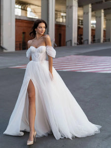Indulge in pure luxury with our Robe Lova. This elegant off the shoulder wedding dress features sparkling sequins and beads, perfect for the modern bride. Its A-line silhouette flatters all body types, while the pristine white color adds an air of sophistication. Make a statement on your special day with this exclusive piece.