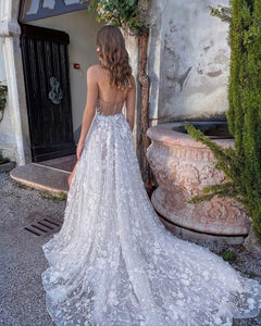 Say “I do” in style with the Louise wedding dress. You’ll be dazzling in this stunning A-Line silhouette featuring 3D floral detailing for a look that’s both romantic and daring. Make the day your own and get ready to set the night ablaze!