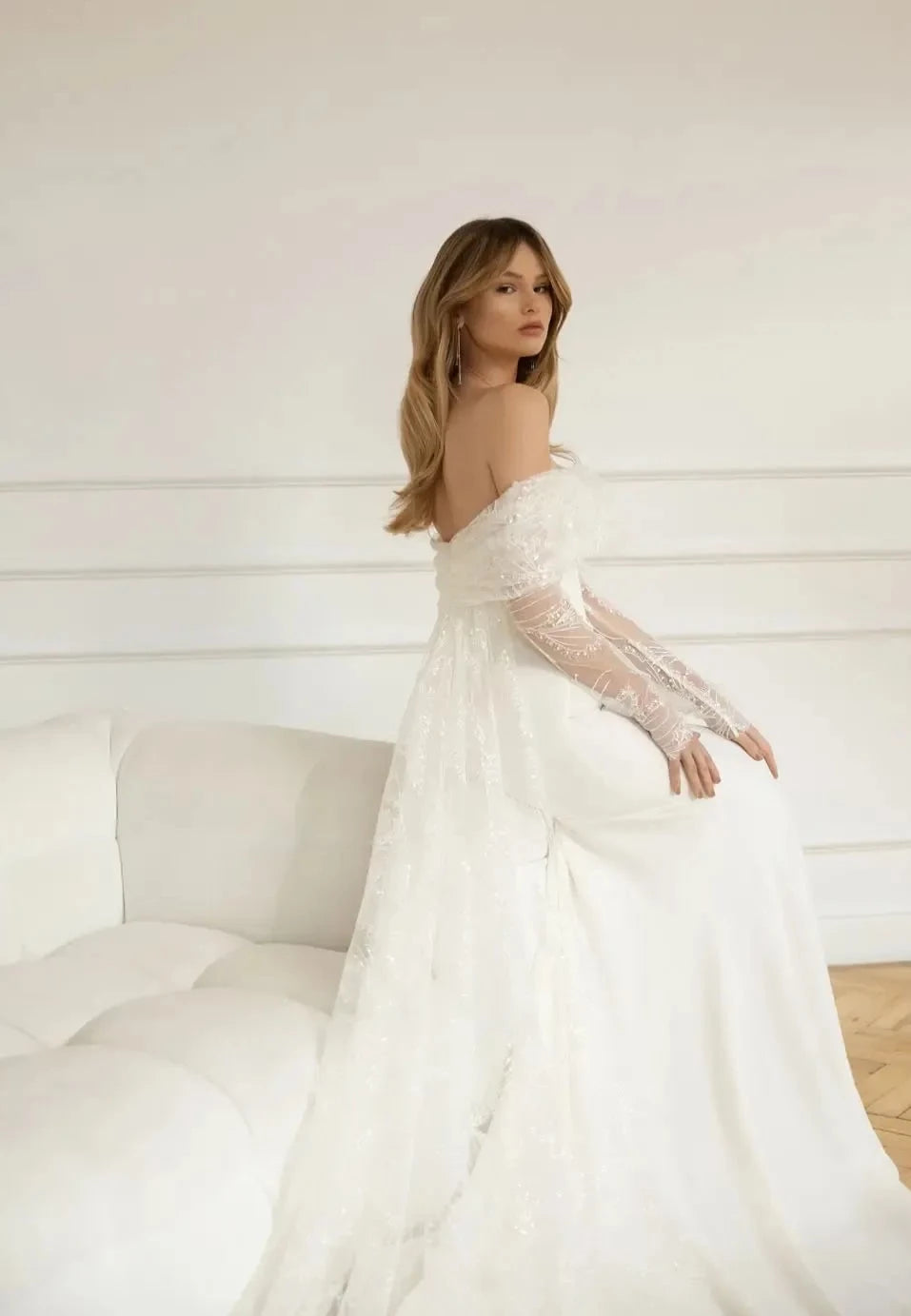 Put a sparkle in your special day with the gorgeous Robe Denisse! Featuring a sweetheart neckline with full long sleeves, this unique sheath bridal gown is sure to turn heads. Wearing it won't just make you look beautiful - you'll feel beautiful too! Make your wedding day unforgettable with Robe Denisse!