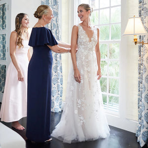 Featuring a romantic floral embroidered design, the Robe Alisha makes a stunning statement for your special day. With its custom-made V-neck open back and elegant tulle wings, this rustic maxi bridal gown exudes effortless grace and beauty. An unforgettable look that will turn heads and make you feel like royalty on your wedding day.