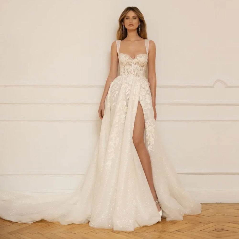 Wrap yourself in luxury with our elegant Robe Remi. The A-line silhouette and spaghetti straps gown give off a chic vibe, while the open leg adds a touch of fantasy. Made with exquisite craftsmanship, this gown is perfect for your dream wedding.