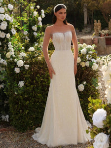 Indulge in luxury with our Robe Amaris, a classic O-neck wedding dress that exudes elegance and sophistication. Adorned with sparkly sequins and beads, this mermaid style gown features a detachable train for added drama. Make a statement on your special day with this exclusive piece.