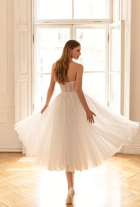Our Dress Celine combines a sweetheart neckline and A-line silhouette for a flattering and classic bridal look. The two-piece design adds a modern twist, providing versatility for different wedding styles. Perfect for brides who want a timeless yet unique wedding dress.