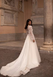Feel elegant and chic in Robe Margot's two-piece A-line wedding dress! This bridal look is perfect for making a statement, without going overboard. Whether it's your special day or just an occasion for dress-up, you're sure to steal the show. Get ready for your big entrance!