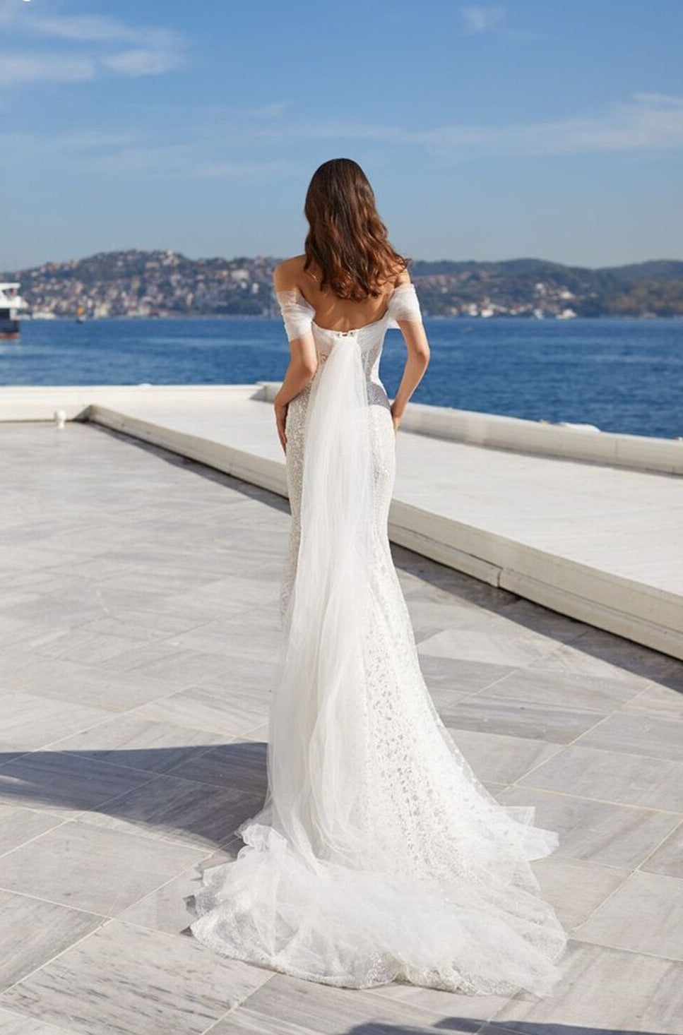 Look like a queen in our stunning Jessie Robe! Illuminating the room with its mermaid lace and off-the-shoulder silhouette, this bridal gown will make you feel like you're ready to rule the night. So, don your crown and get ready for the royal treatment you deserve!