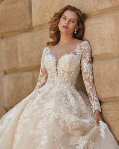 Elevate your bridal look with our Robe Adeline! This elegant lace gown features chic mid sleeves and a flattering A-line silhouette. The classic white color adds a touch of sophistication to your wedding ensemble. Make a statement on your special day with this must-have piece!