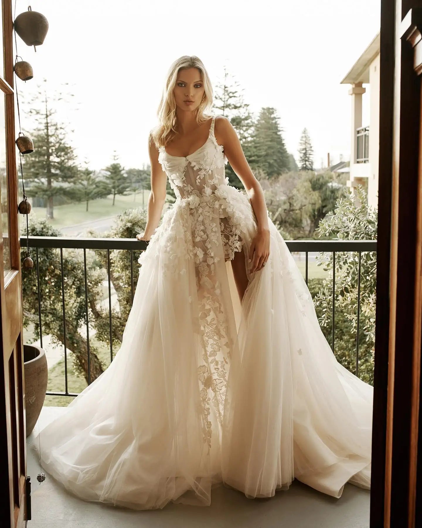 Indulge in the luxurious versatility of our Robe Paulette. This stunning 2-in-1 lace wedding dress features a detachable skirt, perfect for transforming your look from ceremony to reception. Elevate your special day with this one-of-a-kind piece, fit for a sophisticated bride.