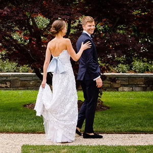 Turn heads with the Claudette: a romantic, strapless mermaid gown with allover delicate lace and a showstopping brush train. Plus size ribbon self tie ensures it fits like a dream and looks beautiful from every angle. Dare to be bold and make an unforgettable statement on your special day.