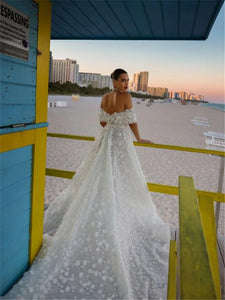 Indulge in the opulence of our Robe Julienne, a luxury bridal dress that exudes elegance and sophistication. This ball gown features exquisite lace detailing, making it the perfect choice for a fairy-tale wedding. Embrace luxury on your special day with this timeless and tasteful masterpiece.