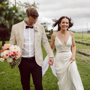 Turn heads at your special day with this exquisite two-piece robe chance dress! Boasting spaghetti straps, a custom made Sheath V Neck and a backless design, this timeless minimalist dress is perfect for any bride looking to make a lasting statement. Crafted from luxurious crepe fabric for ultimate comfort and style, this gorgeous crop top is sure to make your grand entrance memorable!