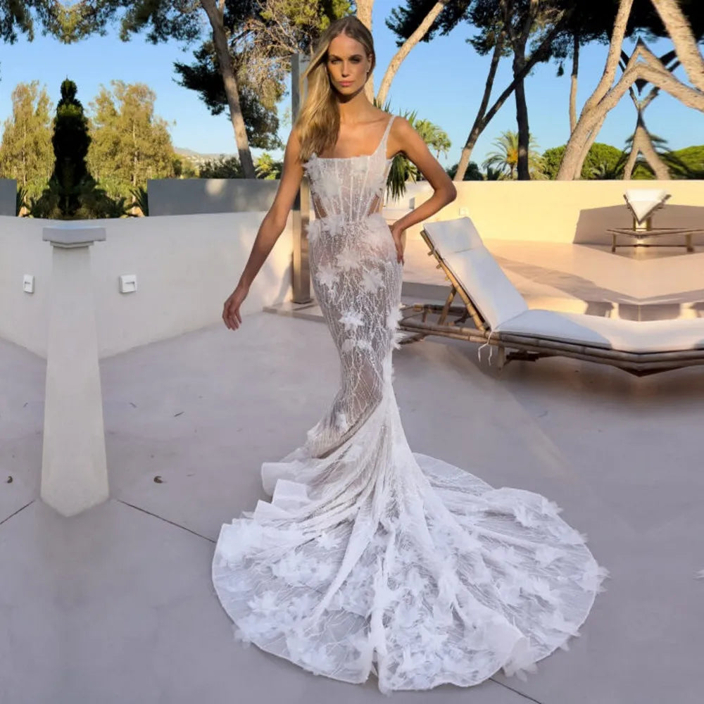 Upgrade your wedding look with our Robe Marilyn. This mermaid lace bridal gown will enhance your figure while adding a touch of elegance. Embrace your inner Marilyn and feel confident on your special day.