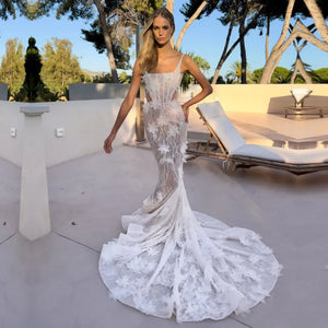 Upgrade your wedding look with our Robe Marilyn. This mermaid lace bridal gown will enhance your figure while adding a touch of elegance. Embrace your inner Marilyn and feel confident on your special day.