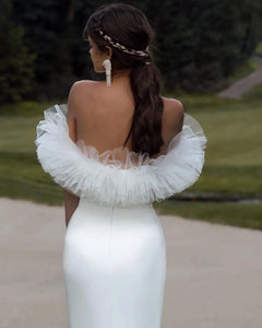 Indulge in the feminine allure of our Robe Allura. This mermaid wedding dress features elegant pleats, a flattering off-the-shoulder design, and a sophisticated backless silhouette. Made from premium elastic satin, this dress is the epitome of luxury and will make any bride feel like royalty.