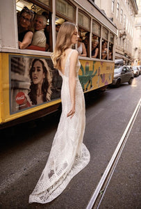 Elevate your elegance and grace with the Claire Dress. This wedding gown is an exceptional choice for your special occasion, showcasing unparalleled style. Make a dazzling statement in this magnificent gown - exude confidence and stand out!