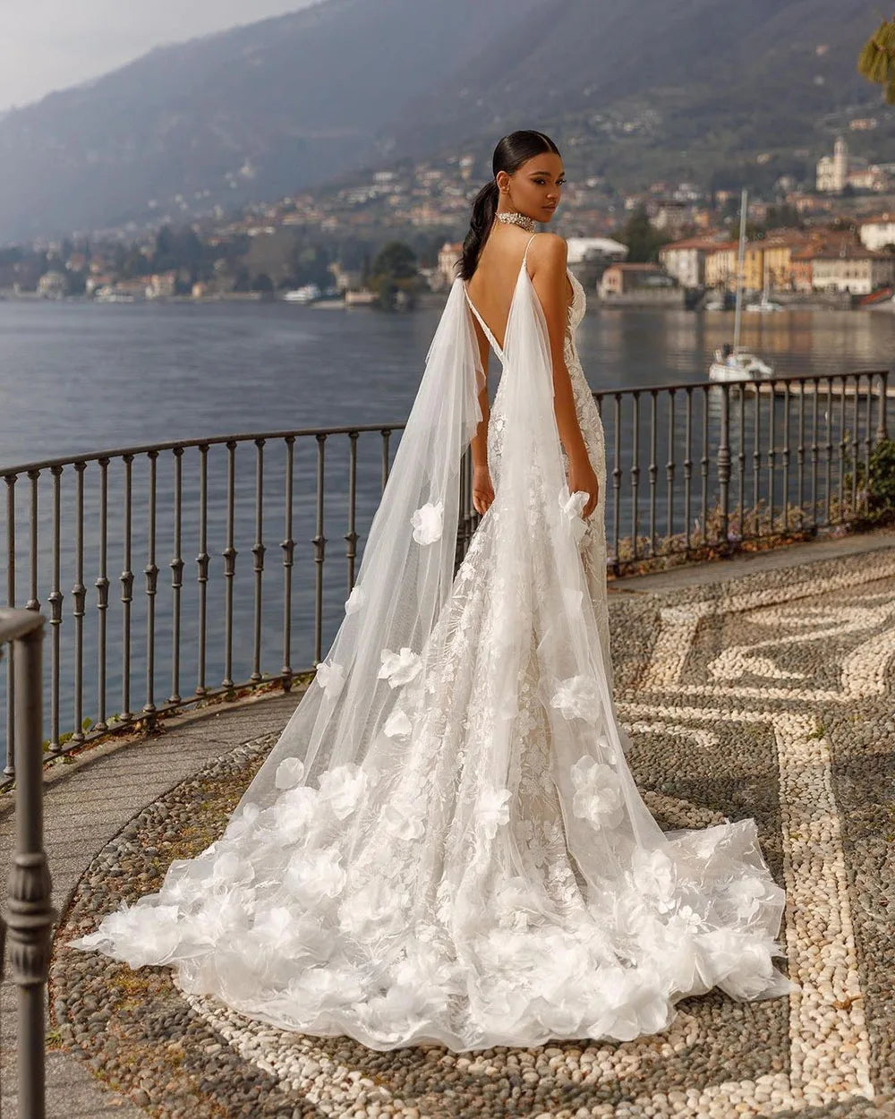 Be a whimsical bride in our Robe Rosette! Designed with delicate fairy lace, this mermaid wedding dress will make you feel like a dream. Dance the night away in its flowing skirt and stun your guests with its elegant rosette details. Perfect for a fairytale wedding.
