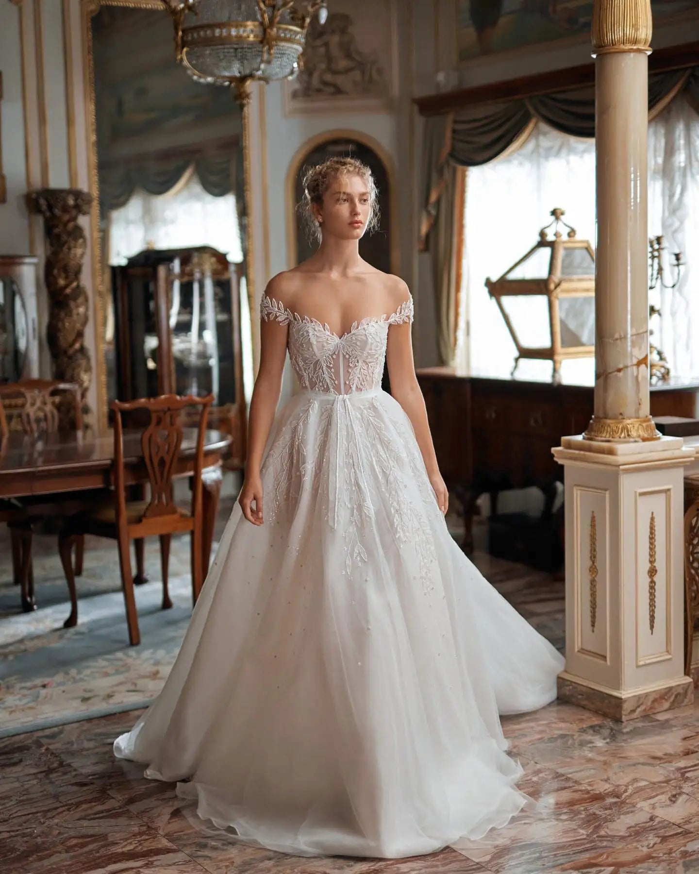 Indulge in luxury on your special day with our Dress Denisse. This stunning ball gown dress features delicate lace, long elegant sleeves, and a flattering silhouette. Perfect for a grand entrance and unforgettable memories. Elevate your wedding attire and make your dreams come true with Dress Denisse.