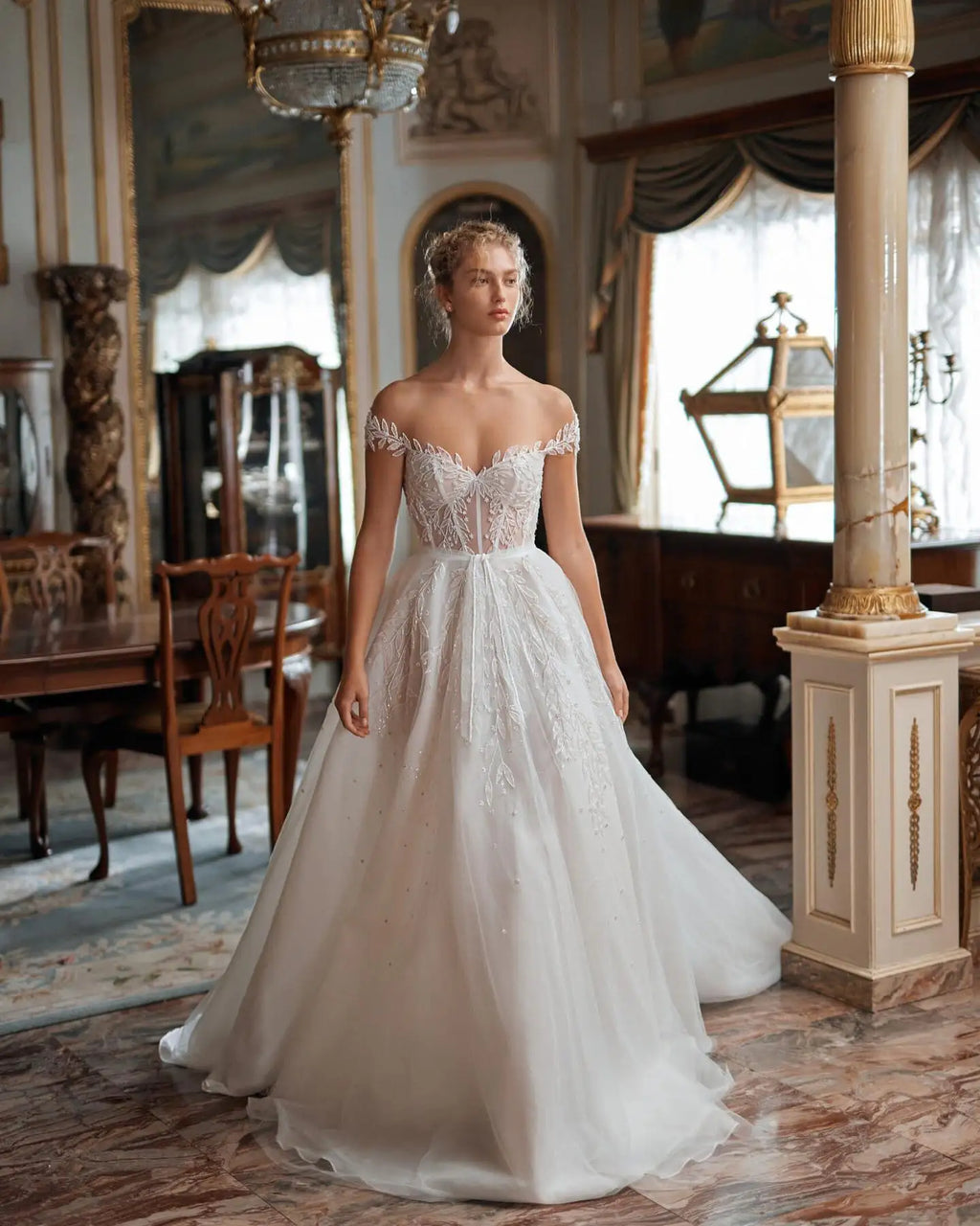 Indulge in luxury on your special day with our Dress Denisse. This stunning ball gown dress features delicate lace, long elegant sleeves, and a flattering silhouette. Perfect for a grand entrance and unforgettable memories. Elevate your wedding attire and make your dreams come true with Dress Denisse.