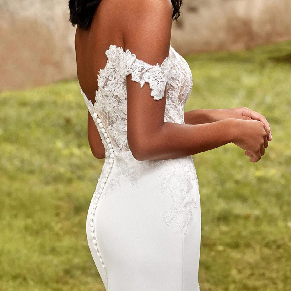 Experience the timeless elegance of Robe Fate, the perfect choice for your special day. These mermaid wedding dresses feature delicate boho lace appliques and a stunning backless design that will take your breath away. Feel like a true bride with these intricately crafted bridal gowns.