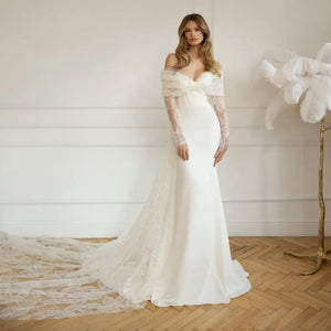 Put a sparkle in your special day with the gorgeous Robe Denisse! Featuring a sweetheart neckline with full long sleeves, this unique sheath bridal gown is sure to turn heads. Wearing it won't just make you look beautiful - you'll feel beautiful too! Make your wedding day unforgettable with Robe Denisse!