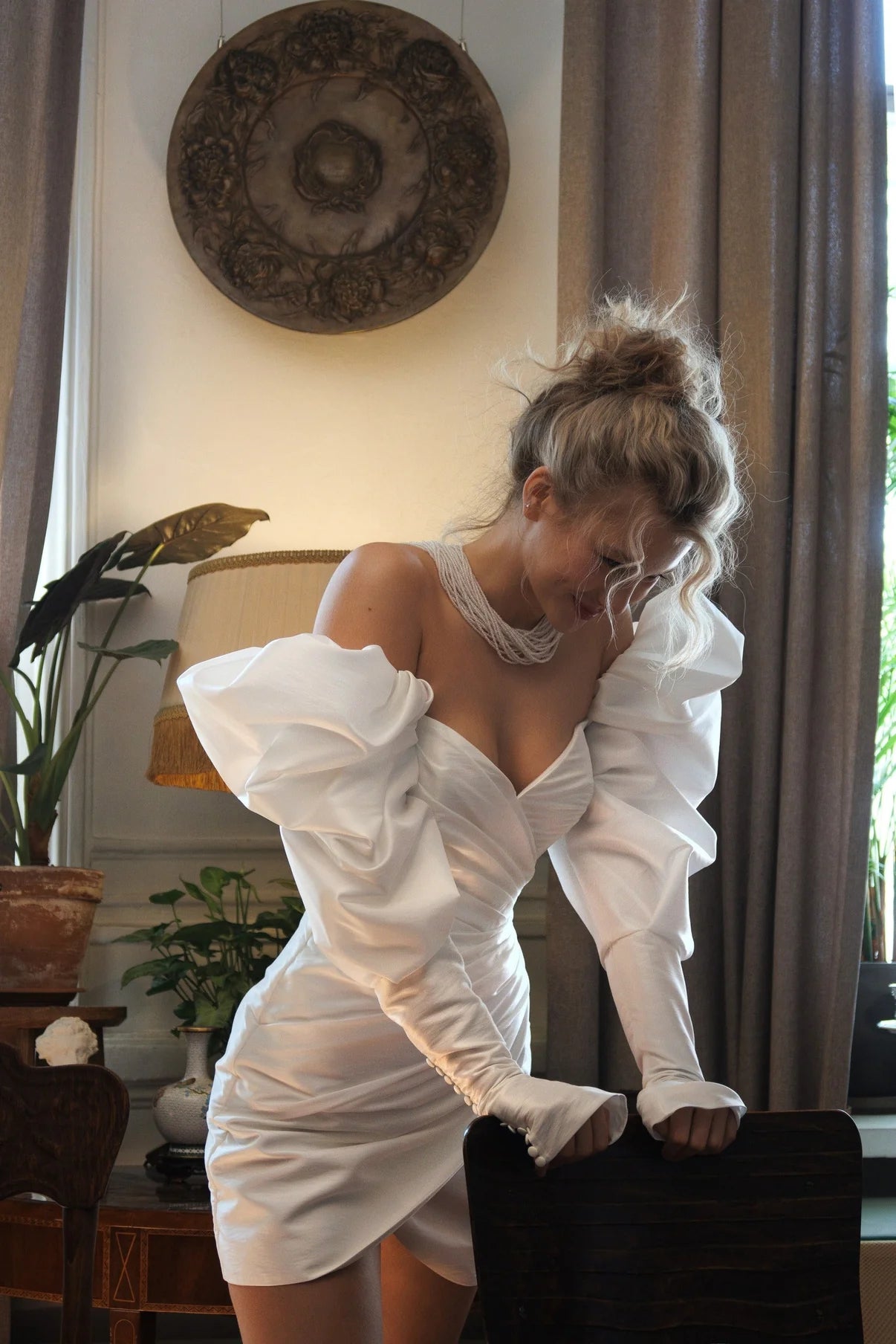 Indulge in exquisite craftsmanship with our Symphony Mini Dress. Each bespoke stitch is a testament to the expertise of our skilled artisans, resulting in a timeless and elegant look. Made with premium materials, this dress is versatile enough to elevate your style in any season.