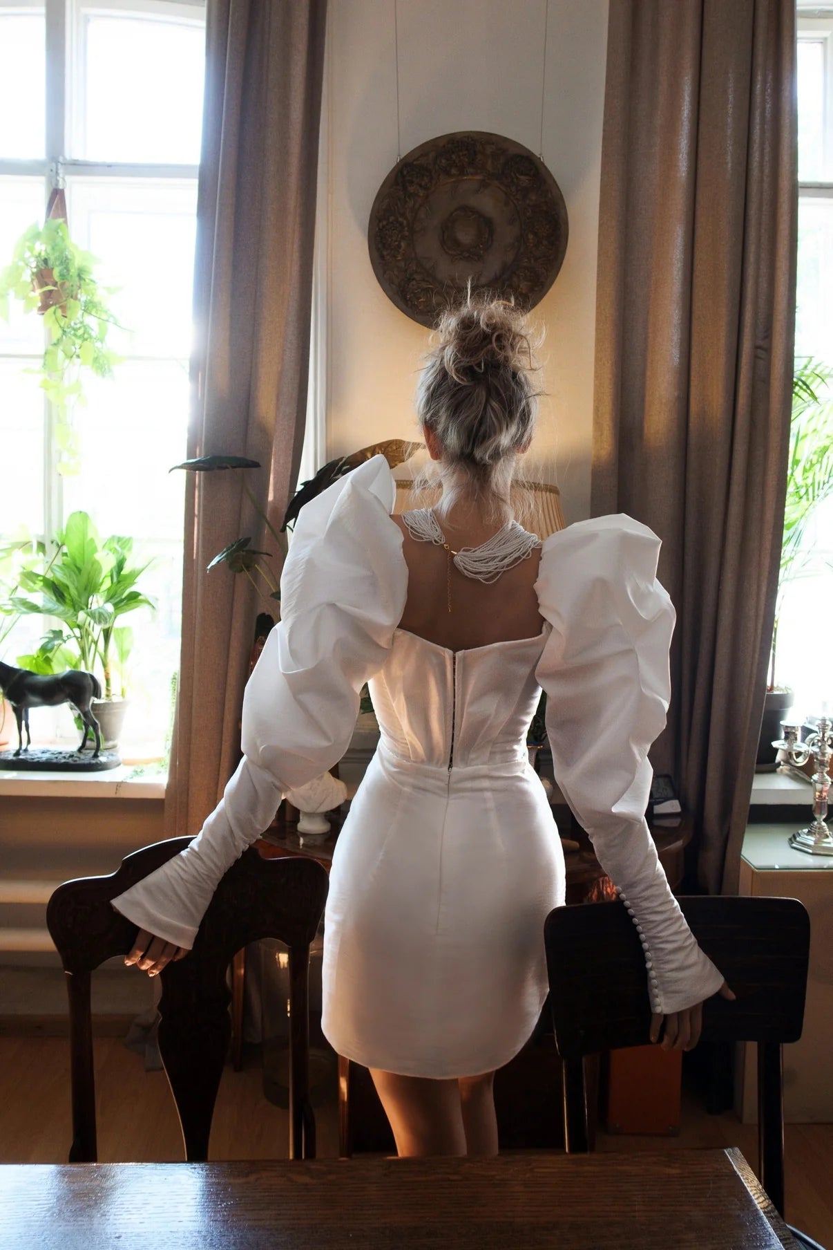 Indulge in exquisite craftsmanship with our Symphony Mini Dress. Each bespoke stitch is a testament to the expertise of our skilled artisans, resulting in a timeless and elegant look. Made with premium materials, this dress is versatile enough to elevate your style in any season.