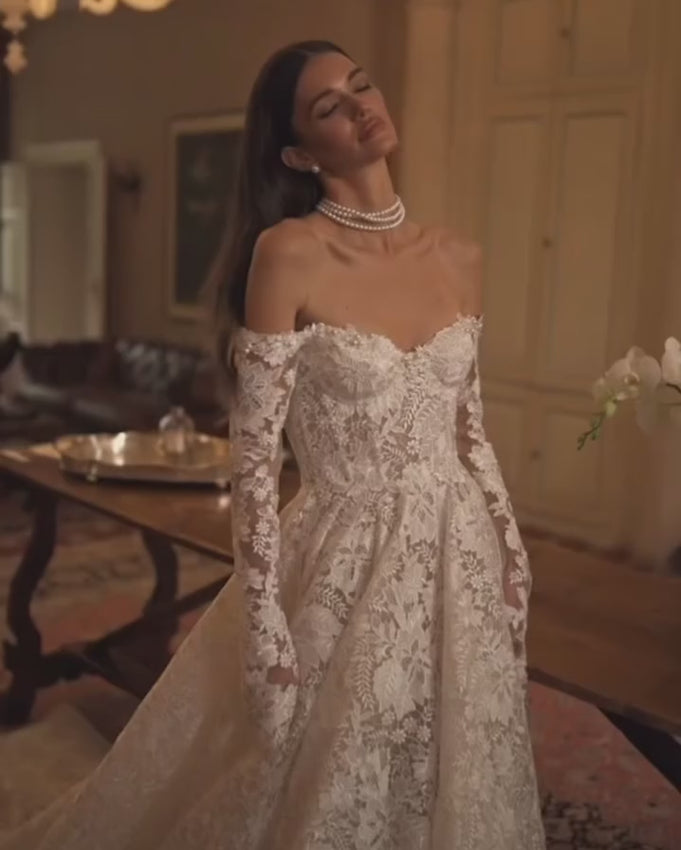Discover the enchanting elegance of our Amira Gown, inspired by modern fairytales. Crafted with luxurious lace, this ballgown highlights your beauty and brings a touch of timeless grace to any special occasion. Make a statement with this stunning gown.