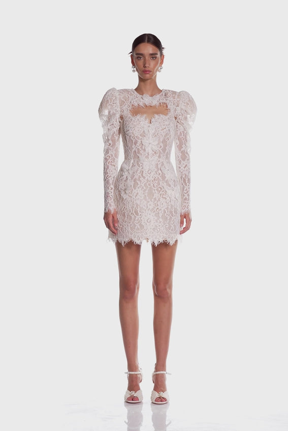 Elevate your bridal look with the Colette Lace Mini Dress. The sweetheart neckline and butterfly embellishments exude feminine grace, while the boned bodice and structured skirt provide a flattering silhouette. The hidden adjustable straps ensure a comfortable fit, making this dress perfect for your special day.